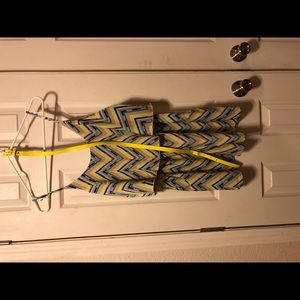 Romper with pockets, and belt .